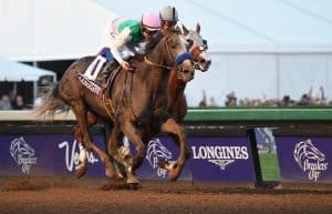 ARCADIA, CA - NOVEMBER 5: Arrogate #10, ridden by Mike Smith, wins the the Breeders' Cup Classic ahead of California Chrome #4, ridden by Victor Espinoza, during day two of the 2016 Breeders' Cup World Championships at Santa Anita Park on November 5, 2016 in Arcadia, California. (Photo by Bob Mayberger/Eclipse Sportswire/Breeders Cup)